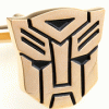 Gold transformers face cufflinks
