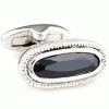 Elegant edged black oval cufflinks