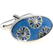 Three flower heads in blue oval cufflinks