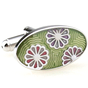 Three flower heads in green oval cufflinks